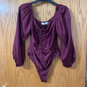 Neverworn ASTR plum satin bodysuit